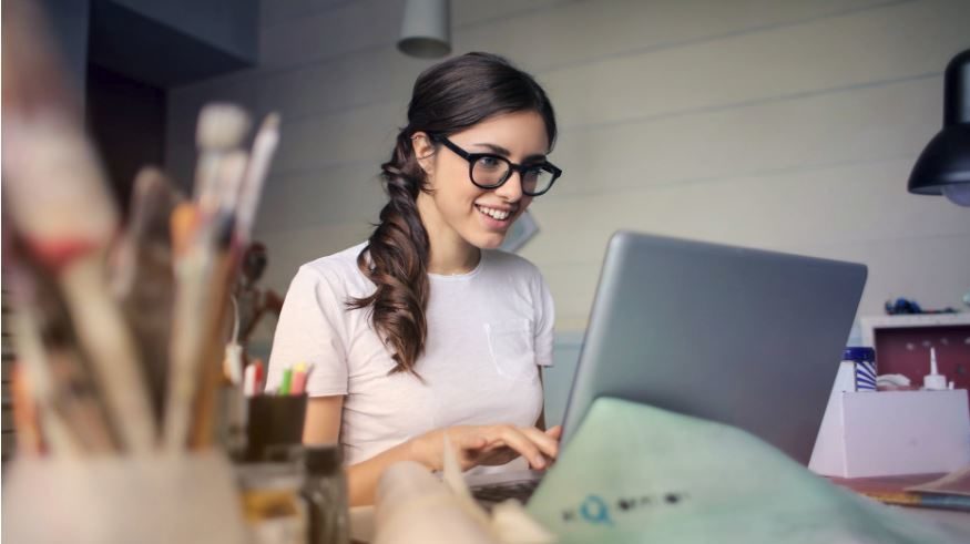Image of a woman running a business from home
